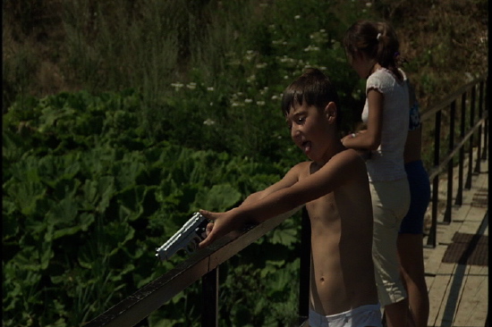 Young boy with gun / "View From the Bridge" Young boy with gun / "View From the Bridge"
